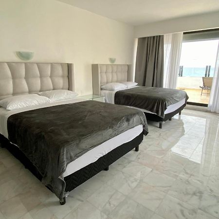 Condo In Ocean Front Resort Канкун Номер фото