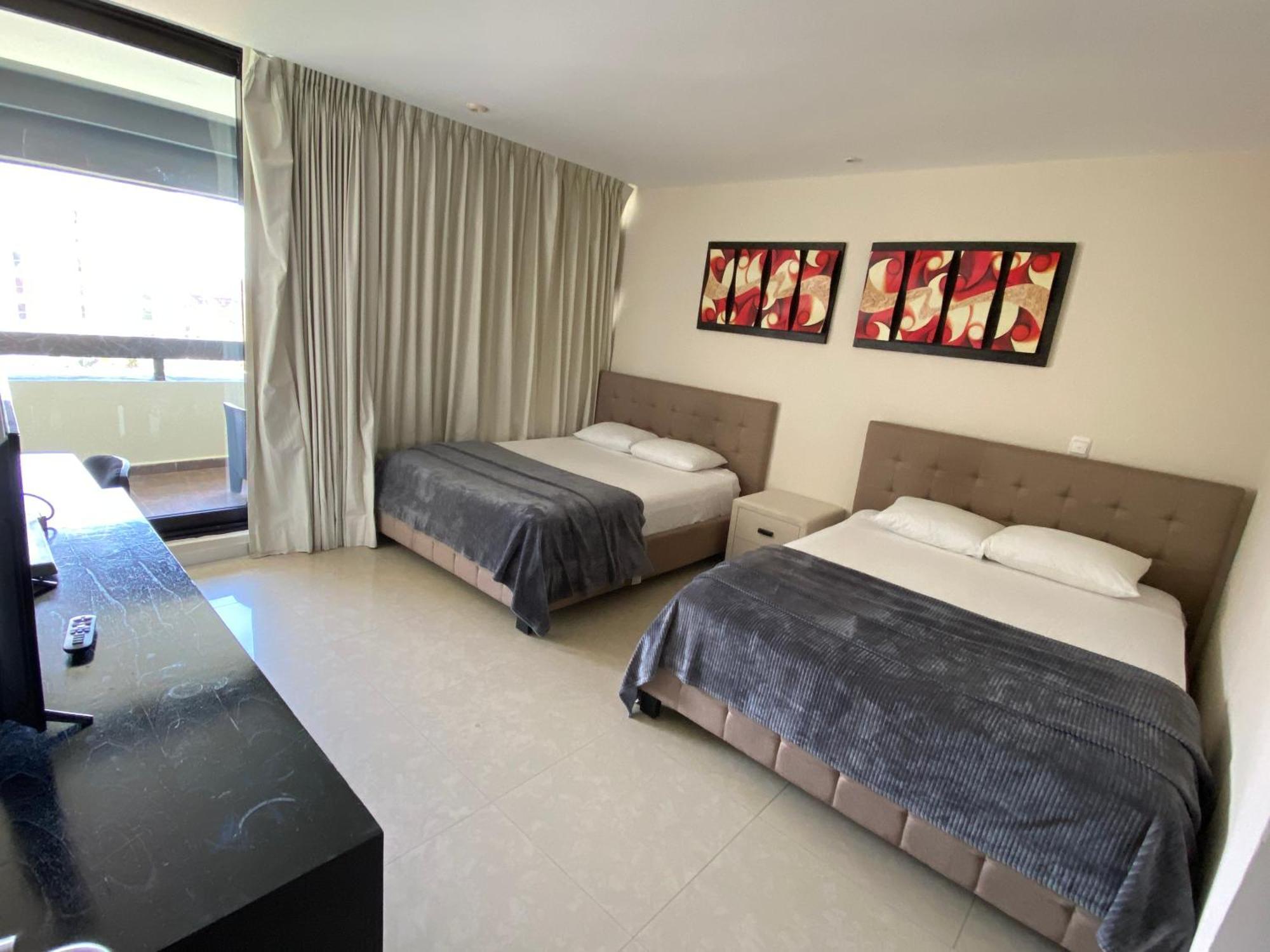 Condo In Ocean Front Resort Канкун Номер фото