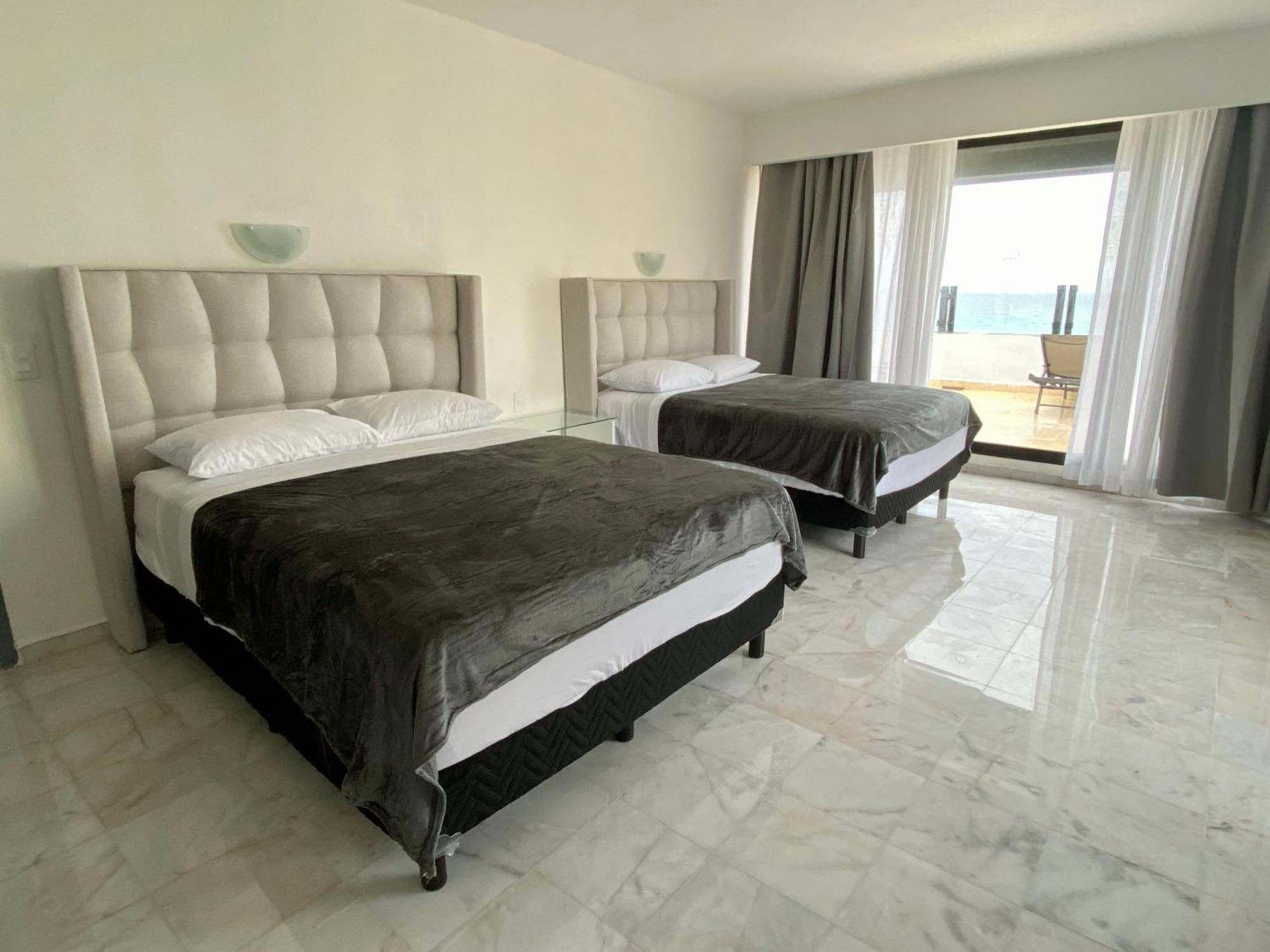 Condo In Ocean Front Resort Канкун Номер фото