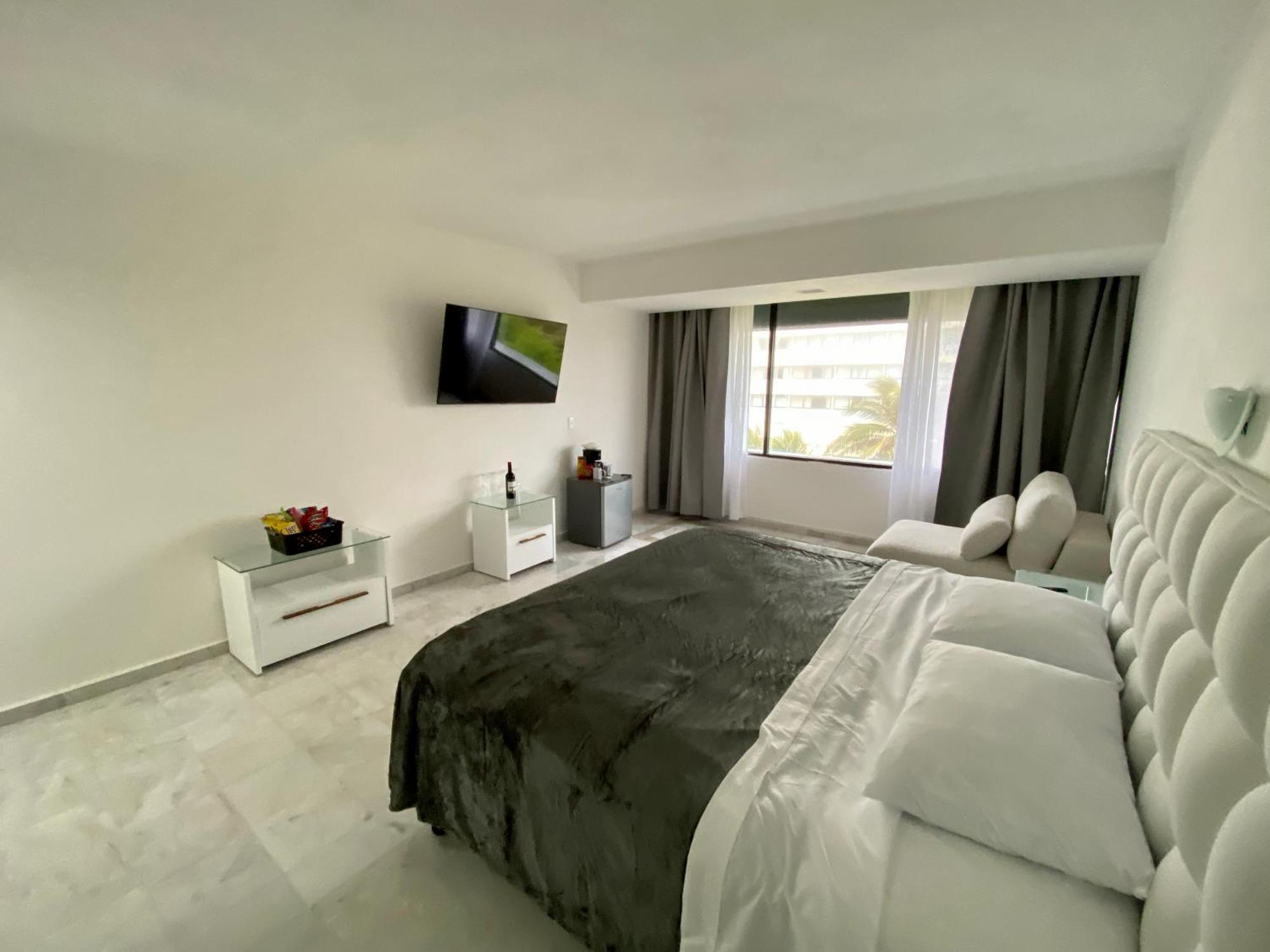 Condo In Ocean Front Resort Канкун Номер фото